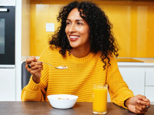 Woman eating cereal